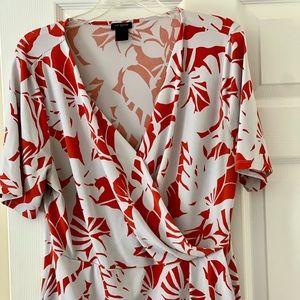 Orange and white wrap style top